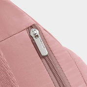 Travelon Anti-Theft Roam Anti-Theft Compact Sling - Desert Pink, close up zipper