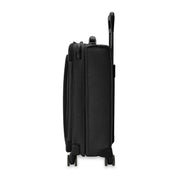 Side view of the Briggs & Riley Baseline Essential 22 Carry-On Expandable Spinner in black, featuring a telescopic handle and four wheels. The sleek design includes visible zippers and a garment folder, showcased against a plain white background.