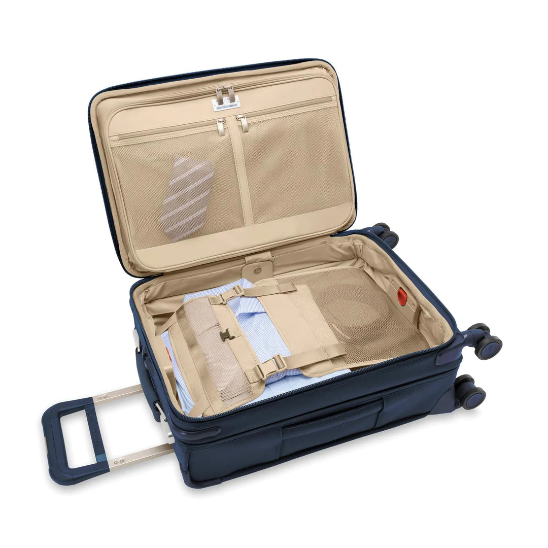 Briggs & Riley Baseline Essential 22" Carry-On Expandable Spinner -  Navy, Interior view with personal stuff inside