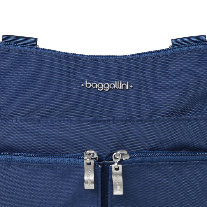 Baggallini Horizon Crossbody - Pacific Blue, close up view of front